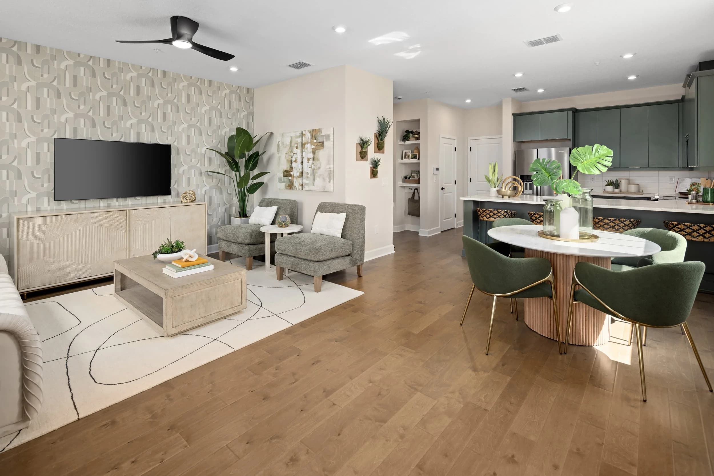 Catalina II model home open-plan great room with staged living and dining, Meadowlark Landing